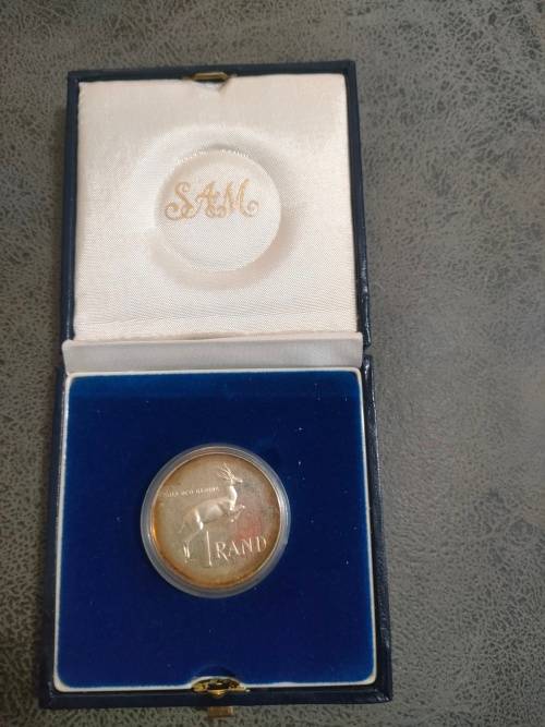 1990 Silver R1 coin in SAM box and capsule