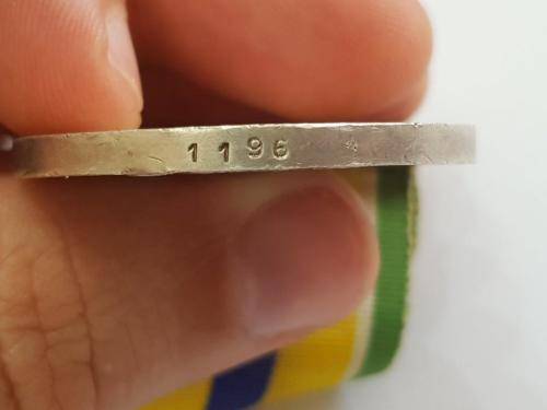 Full size De Wet Decoration, medal number 1196. SA Mint markings.