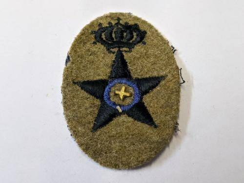 Italian WWII Supply Corps cap badge.