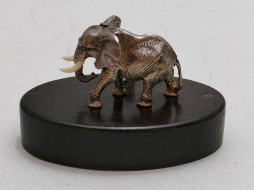 Patrick Mavros Sterling Silver Elephant Bull Place Card Holder with bone tusks.
