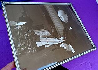 FRAMED PHOTOGRAPH OF WINSTON CHURCHILL ,CONVEX GLASS IN ORIGINAL METAL FRAME