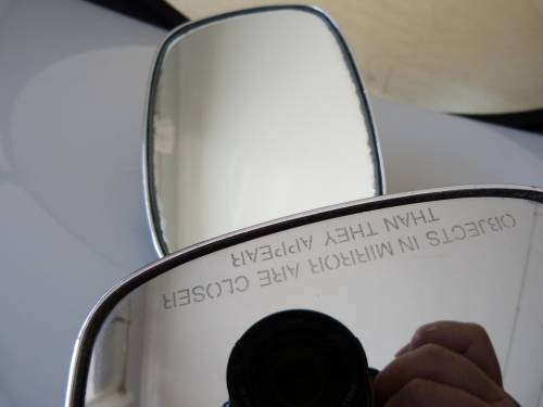 2 VINTAGE MOTORBIKE MIRRORS, ONE IS A HARLEY DAVIDSON.