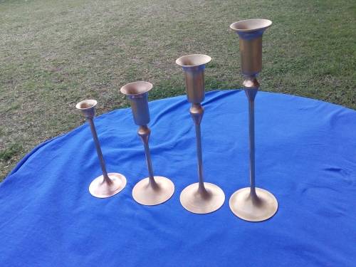 4 Brass candle sticks