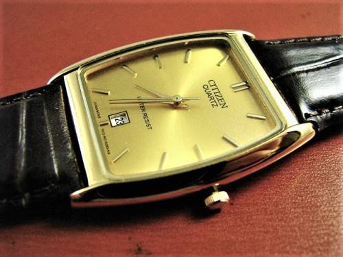 CITIZEN GENTS GOLD DATE WATCH WITH LEATHER STRAP