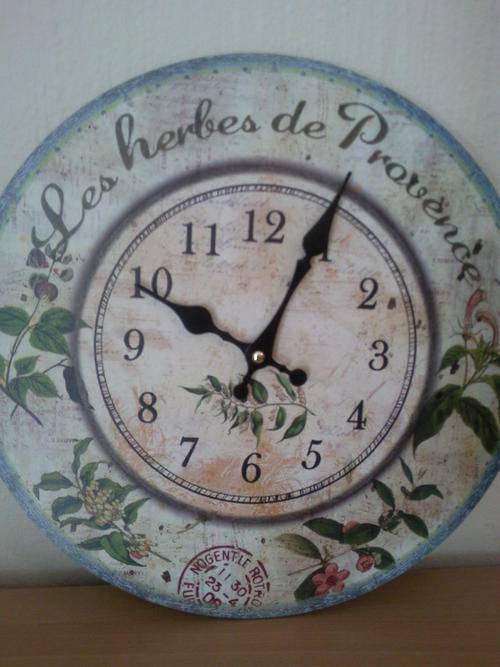 Kitchen clock with a french herb theme