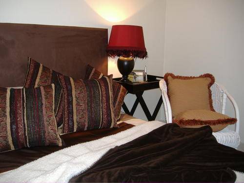 Headboard upholstered in seudette fabric