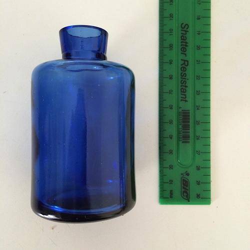 Small blue glass vase