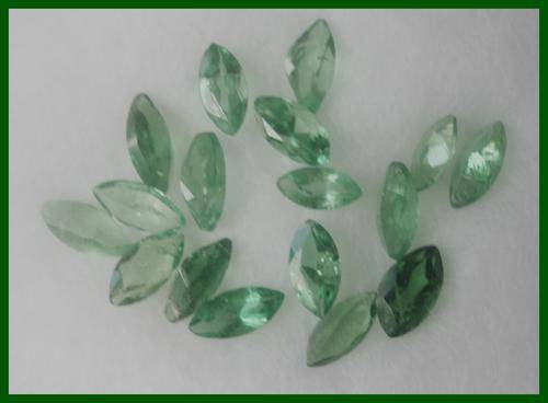 EXQUISITE TOP EMERALD GREEN TSAVORITES  0.66CT  MARQUISE CUT