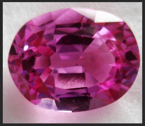 EXQUISITE    CANDY PINK  TOPAZ   OVAL      12.75CT
