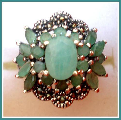 STUNNING, .925  STERLING SILVER RING WITH NATURAL EMERALDS
