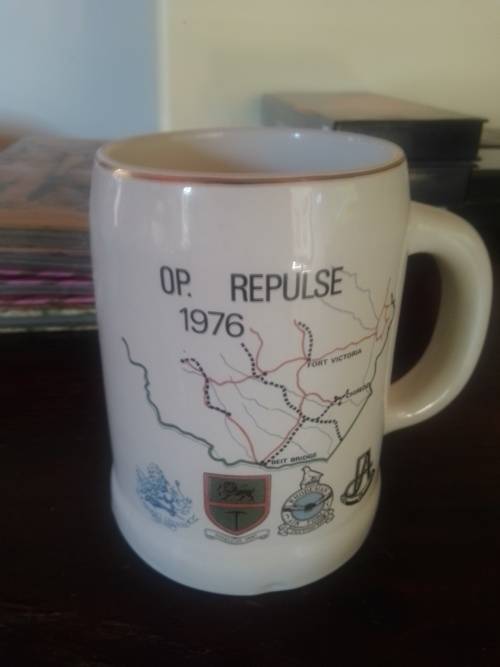 Two Rhodesian bush war souvenir, collectors item bush mugs