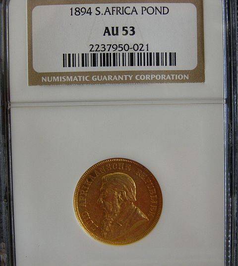 1894 AU53 PAUL KRUGER POND (RARE IN HIGHER GRADES)