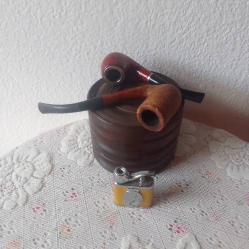 Vintage smoking pipes with tobacco holder and lighter