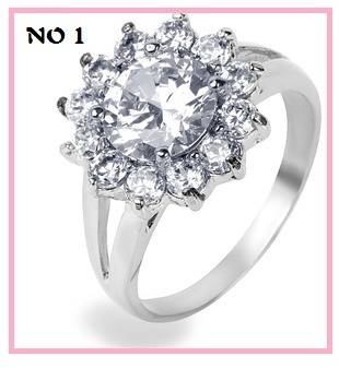 *** 925 STAMPED SILVER PLATED ROUND CUT CRYSTAL RING**R350.00 VALUE**
