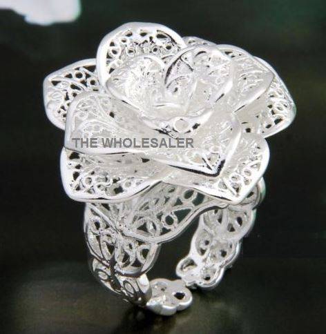 ***925 STAMPED SILVER PLATED ADJUSTABLE RING, WILL ADJUST TO ANY RING SIZE***350.00 VALUE***