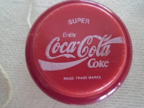 Pair of vintage Yoyos': Bilingual Genuine Russell Professional and Super Coca Cola