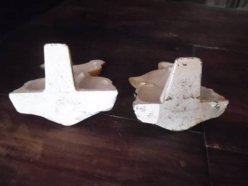 Pair of petite cast metal doorstops. Duck and chicken