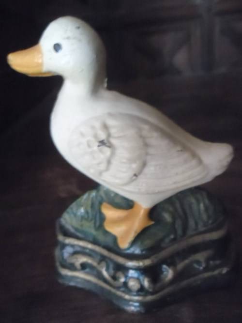 Pair of petite cast metal doorstops. Duck and chicken