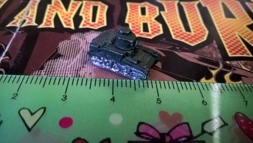 Tiny lead Stuart light tank