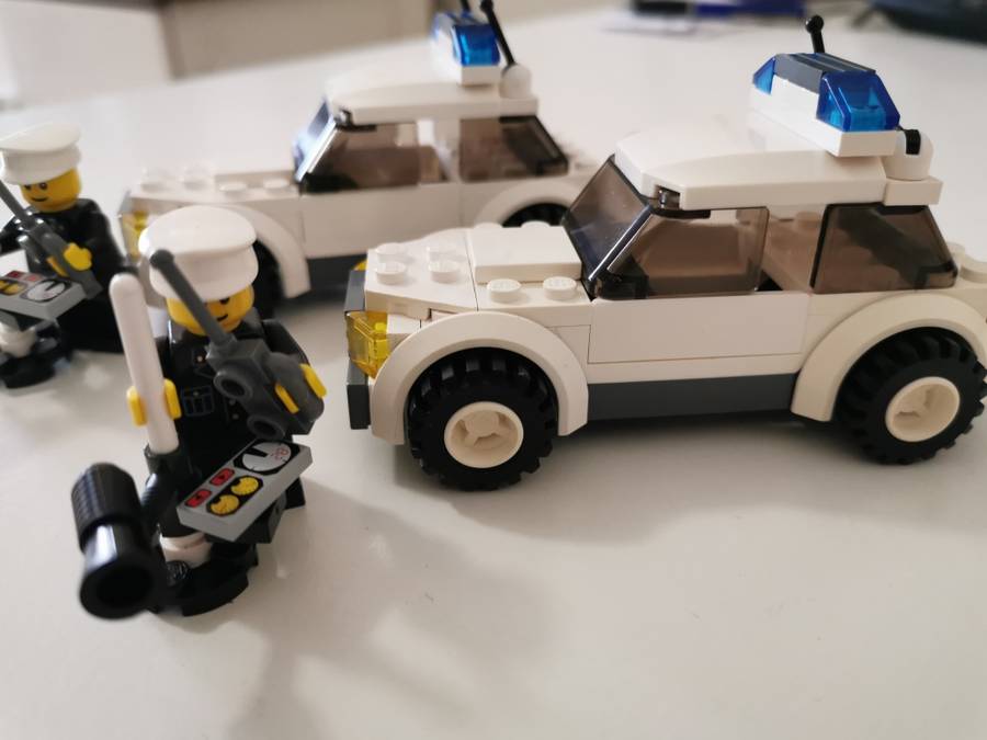 Pair of Lego city police cars no. 7236 auction for two cars as per photo.