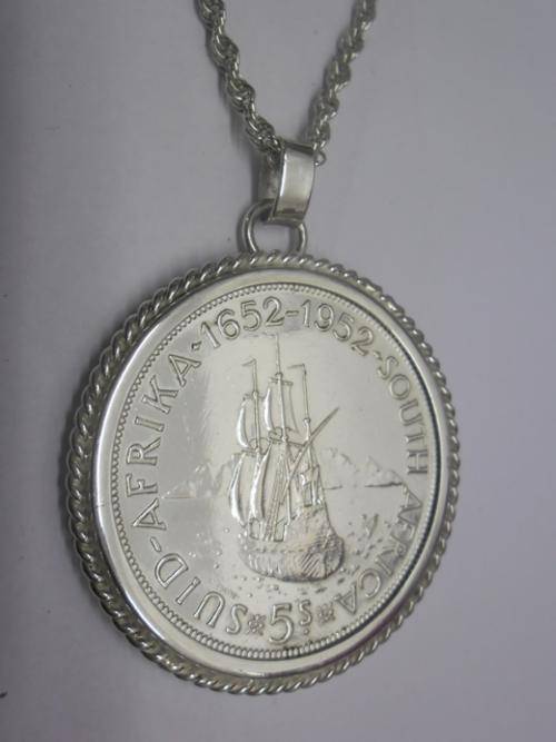 1652-1952 silver 5 shilling in frame with chain