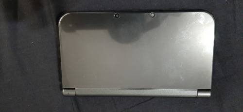 New Nintendo 3D XL ( has a small craxk on the right upper screen corner)