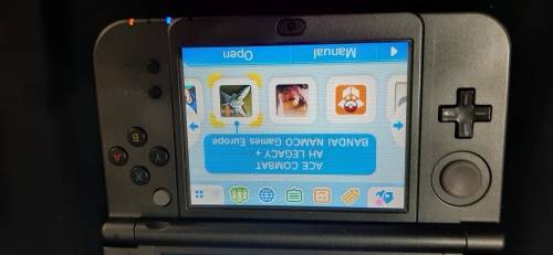 New Nintendo 3D XL ( has a small craxk on the right upper screen corner)