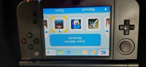 New Nintendo 3D XL ( has a small craxk on the right upper screen corner)