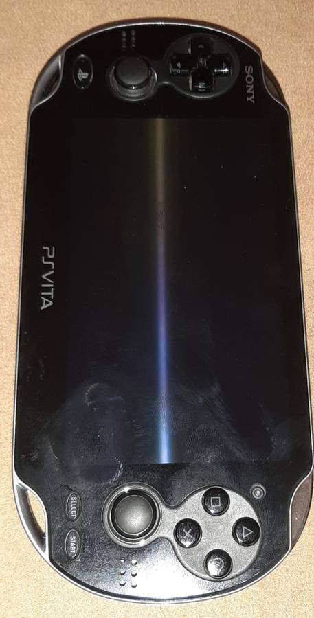 PS Vita 1004 Model ( Very Good Condition) + 1 game and 8 Gb memory card