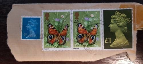 Misc UK STamps on part of envelope