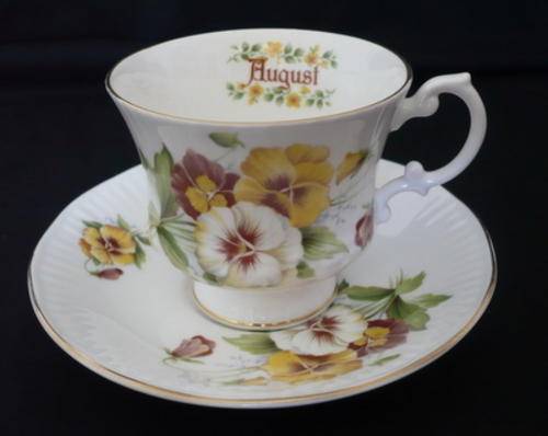 An Elizabethan Staffordshire "August" TEA CUP AND SAUCER