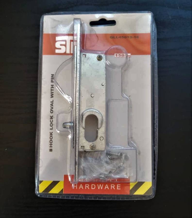 Sliding door cylinder lock with locating pin