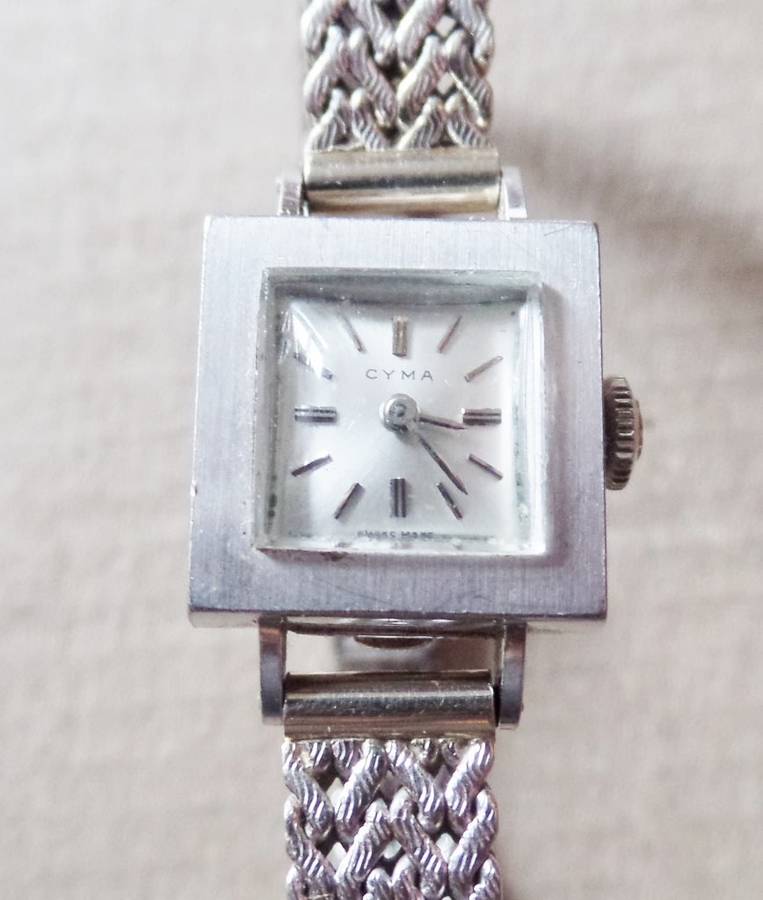 VINTAGE LADIES CYMA 18 CT. WHITE GOLD WATCH AND STRAP