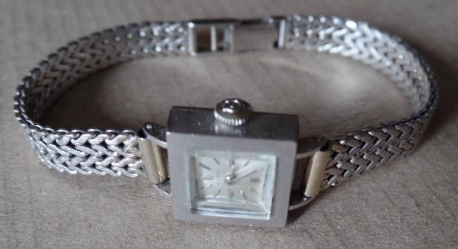 VINTAGE LADIES CYMA 18 CT. WHITE GOLD WATCH AND STRAP