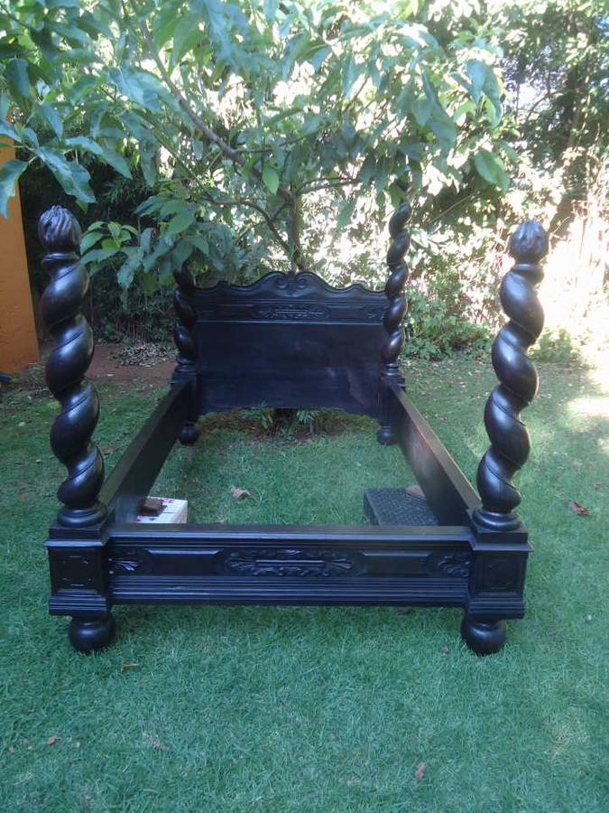 ANTIQUE HEAVILY CARVED FOUR POSTER BED