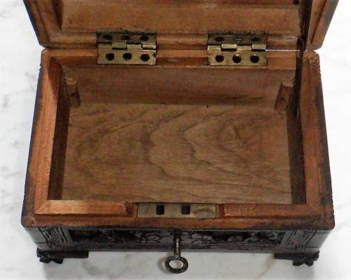 Vintage carved camphorwood jewellery box with key