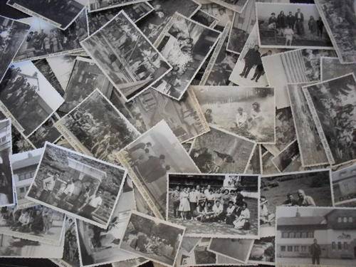 A collection of 96 old black and white photos