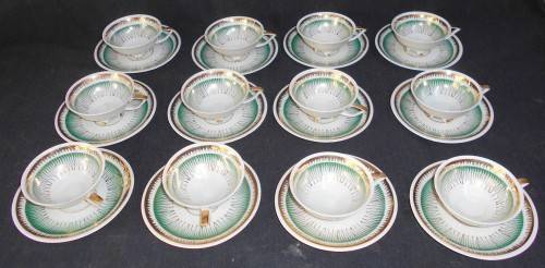 Vintage German Porcelain. 12 demitasse duo's on paw feet........gorgeous!!!!