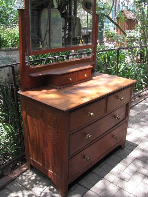A VINTAGE TEAK DRESSING TABLE