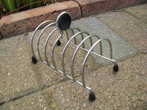 A LOVELY TOAST RACK.....VERY UNUSUAL DESIGN. POSSIBLY 1950'S @ CRAZY R1 START