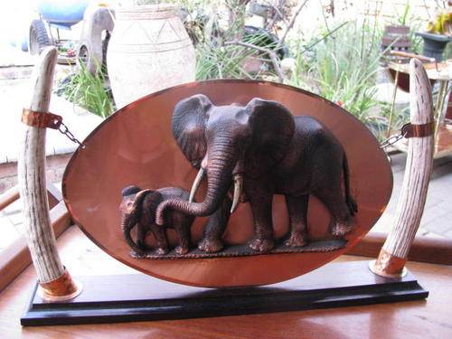 A RETRO COPPER ORNAMENT BY NF COPPER... ELEPHANTS ON COPPER SUSPENDED BY TUSKS  @ CRAAZZY R1 START