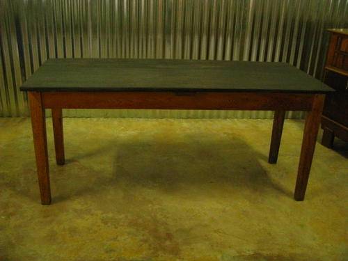 A VINTAGE (POSSIBLY 1910 OR SO) OREGON TABLE WITH CHAMFERED LEGS