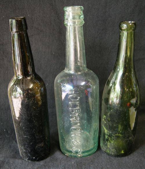 Assorted Green and Brown Glass Drinks Bottles