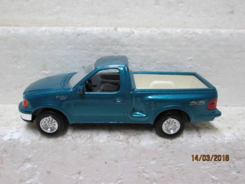 1:43 SCALE DIE-CAST -FORD F150 FLARESIDE 4X4 1997 - LOT 849R