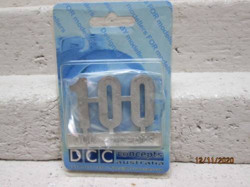 REDUCED TO CLEAR : DCC CONCEPTS : `100` WHITE METAL BADGE