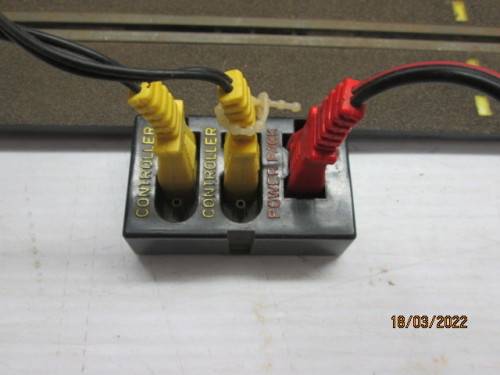 1: 32 SCALE : SCX/TYCO TRACK TRANSFORMER AND CONTROLLERS
