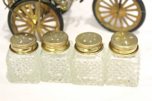 Salt & Pepper sets on a delivery bike - A stunner! - A beauty at a low price, bid now