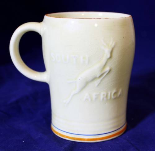 Crown Devon - embossed 1947 Royal visit to RSA mug