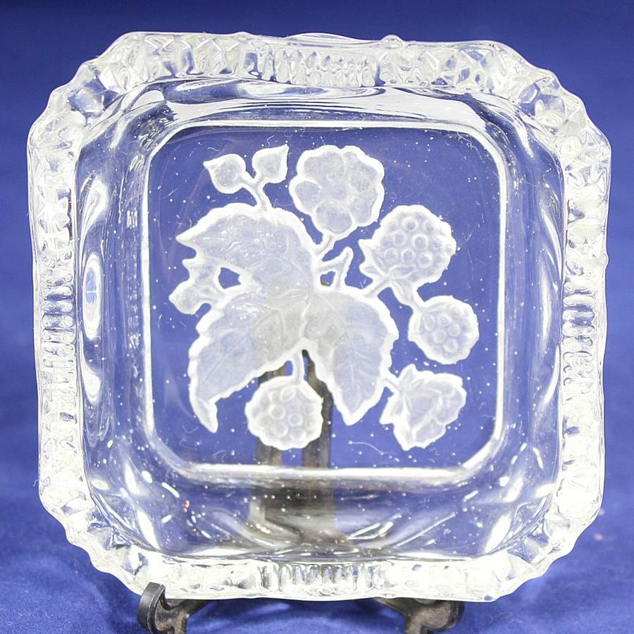 Glass trinket bowl - with carved flowers