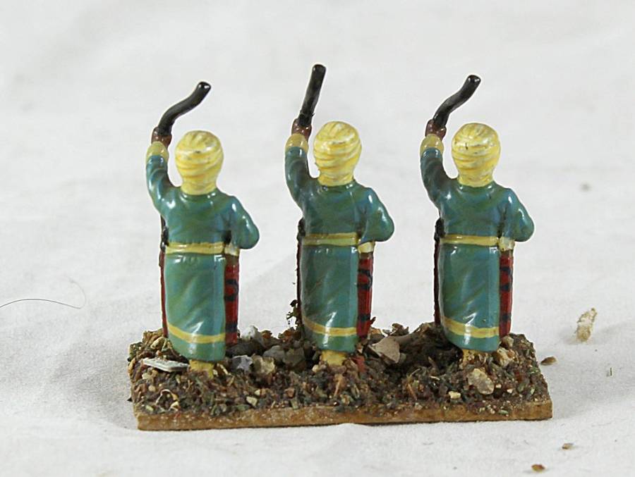 Lead figurines -three Arabian archers